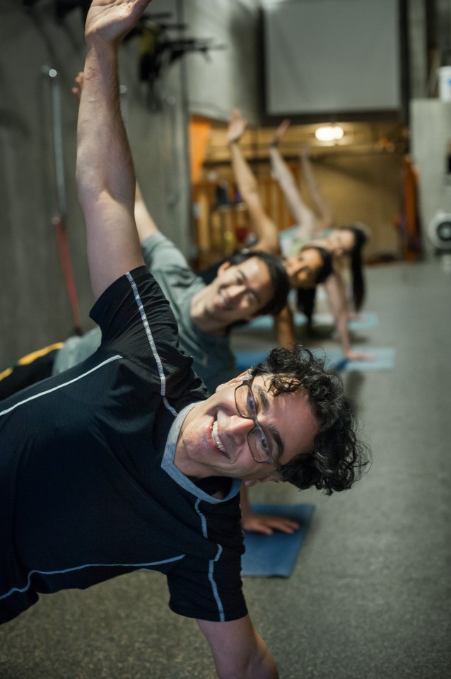 Clinical Professor Kam Shojania (in foreground) leads his residents in a weekly workout.