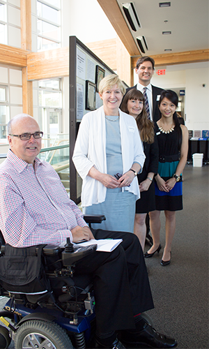 BC Attorney General Suzanne Anton, MLA for Vancouver-Fraserview, and David Eby, MLA for Vancouver-Point Grey, meet with UBC students Marie Maratos and Linh Huyng, as well as stroke survivor, as well as Greg McKinstry (front), Vice President of the Stroke Recovery Association of BC, at the 10th annual Capstone Conference. 