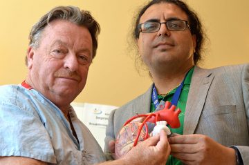 Inventors and UBC researchers Guy Fradet (left) and Hadi Mohammadi hold up their synthetic heart tissue.