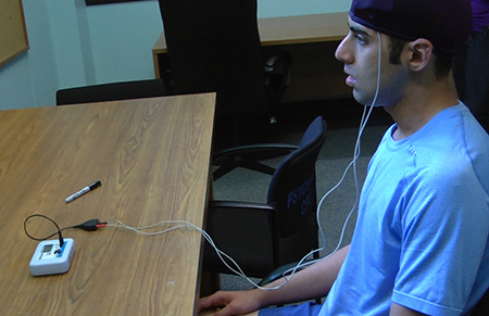 A research participant receiving transcranial direct current stimulation.