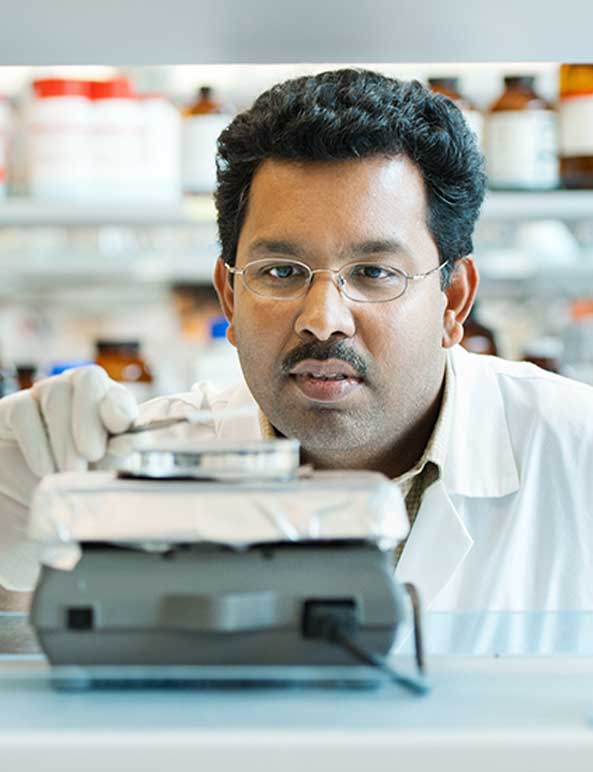 UBC scientist Dr. Jay Kizhakkedathu in his lab. 
