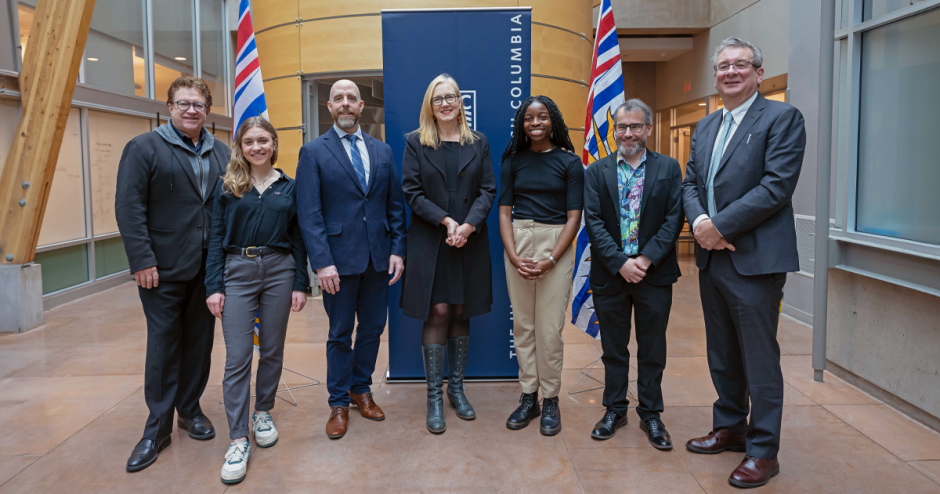A group photo of seven individuals. (Left to right) UBC provost Dr. Gage Averill, UBC president Dr. Benoit-Antoine Bacon, data science student Sandra Starnberg, Minister Brenda Bailey, biomedical engineering student Coralie Tcheune, UBC Science dean Dr. Mark MacLachlan, and UBC Medicine dean and vice-president, health, Dr. Dermot Kelleher.